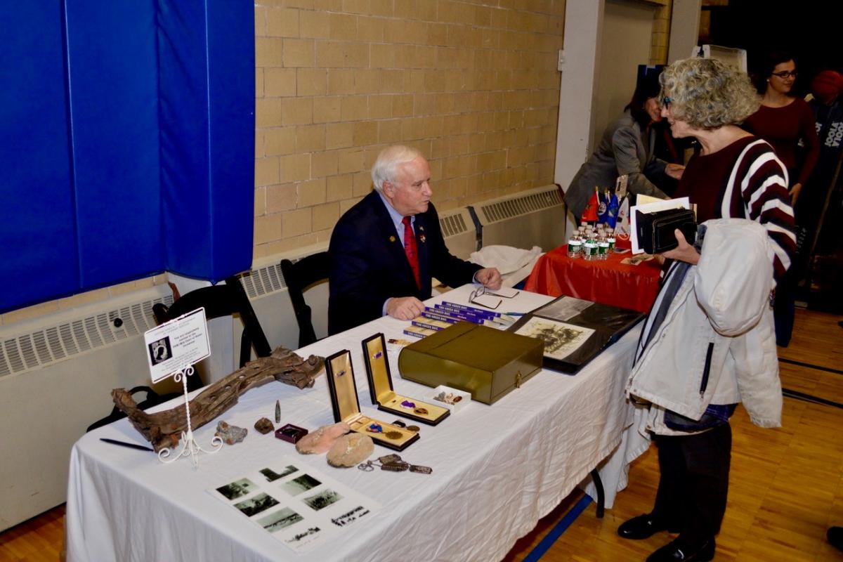 POW/MIA Chair of Honor Ceremony at Ipswich Town Hall - Jim Kurtz, Author of the Green Box talking with guests